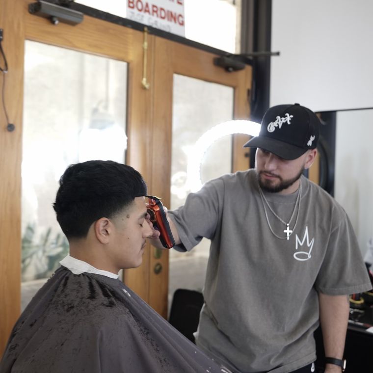 Barber Brill giving a fresh fade and lineup at ICON by Kings Korner in San Marcos, TX